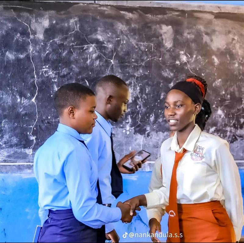 Nankandula Secondary School students greeting one another